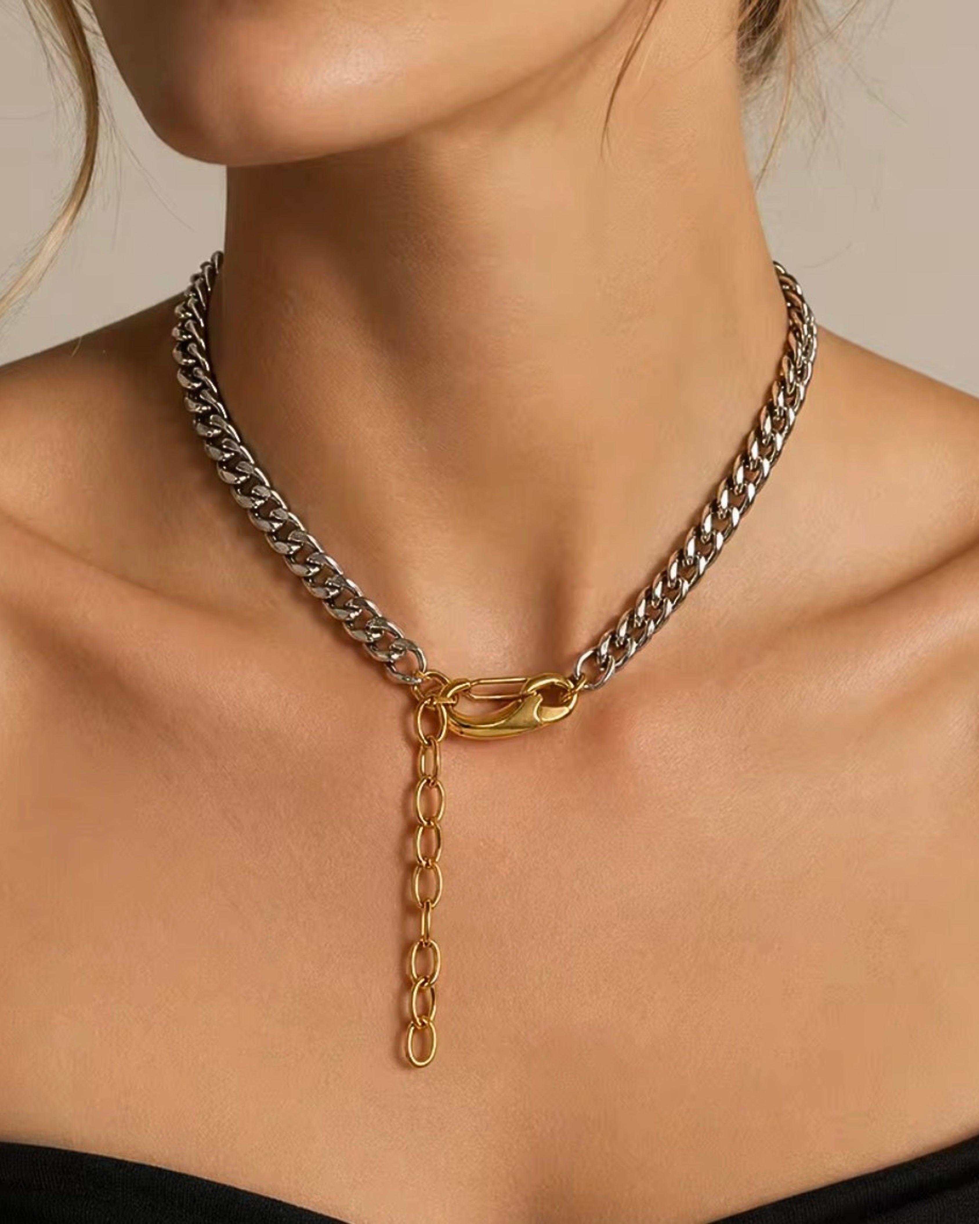 Two-tone silver and gold Cuban chain necklace close-up