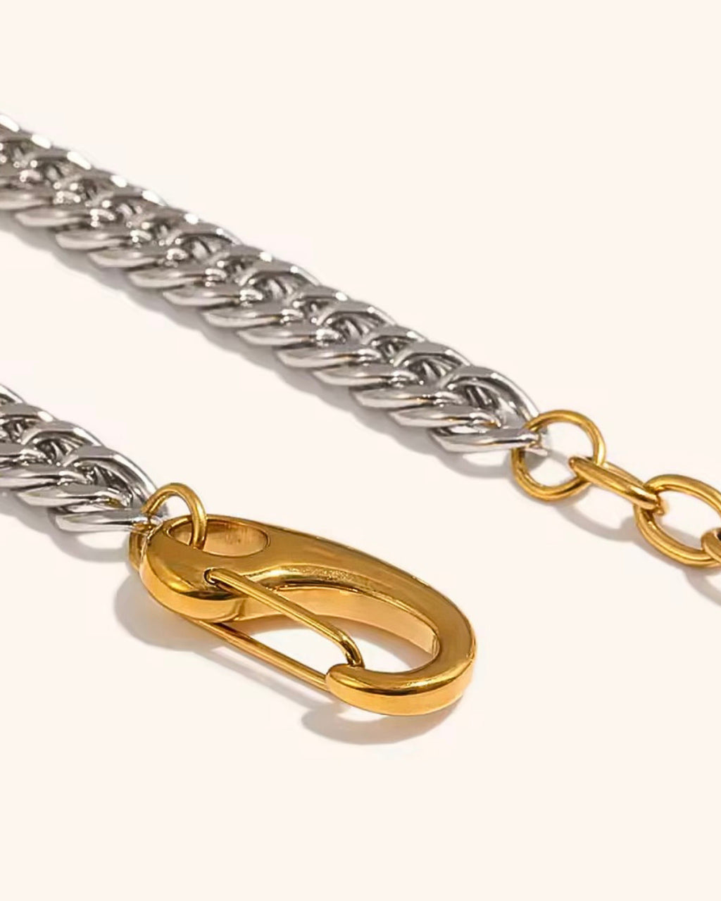 Gold lobster clasp and extender on silver Cuban chain necklace
