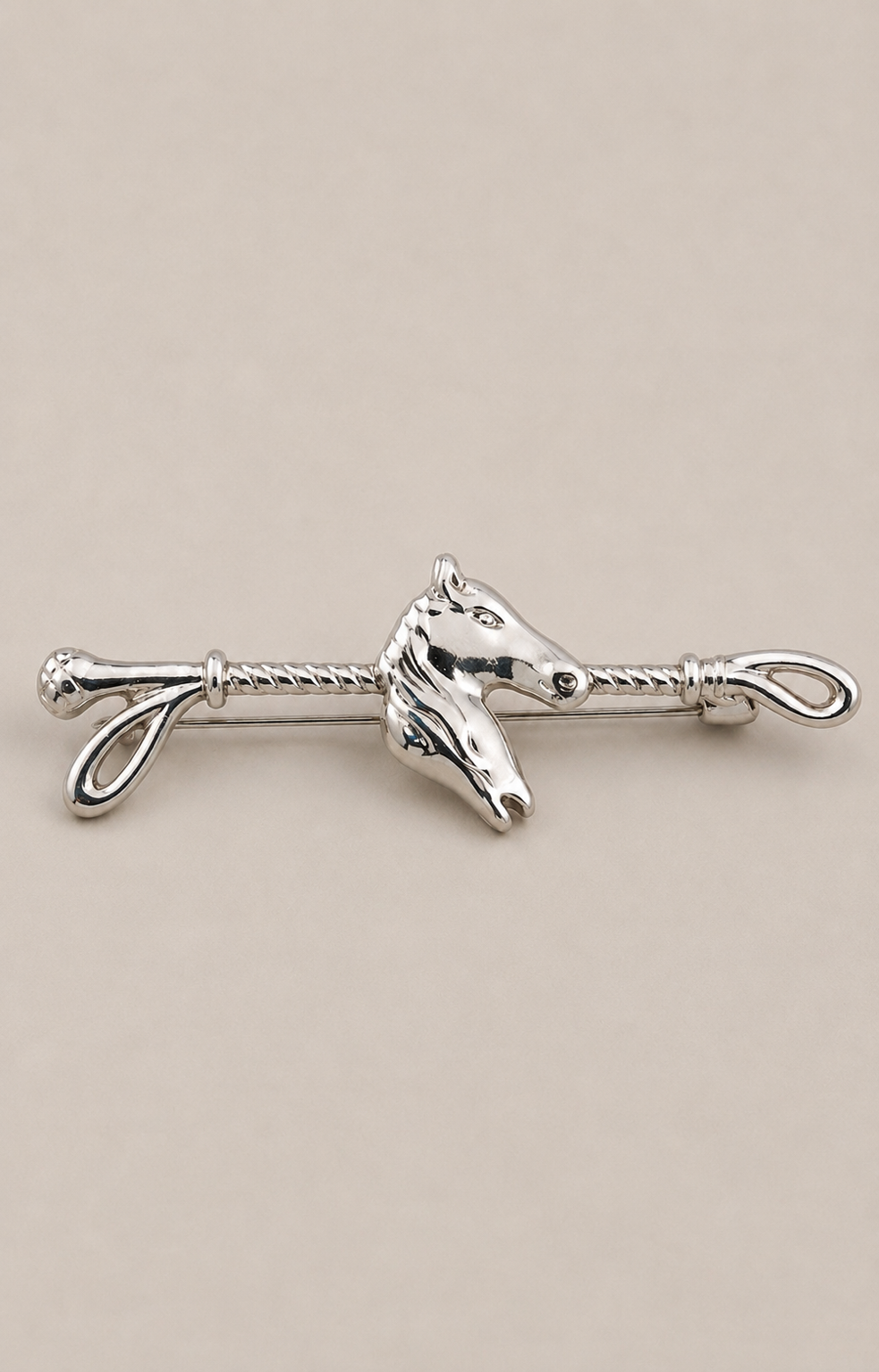 Polished gold equestrian horse brooch and lapel pin